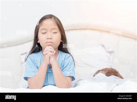 Little Girl Praying On Bed Little Asian Girl Hand Praying Hands