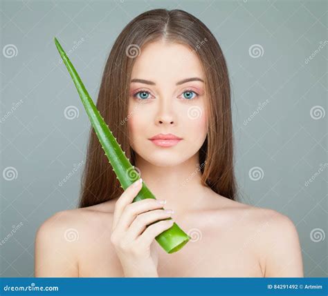 Model With Aloe Vera Portrait Happy Woman With Naked Shoulders Holding