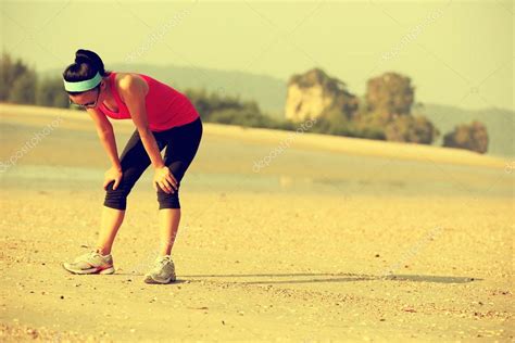 Tired Woman Runner Stock Photo By ©lzf 67863121