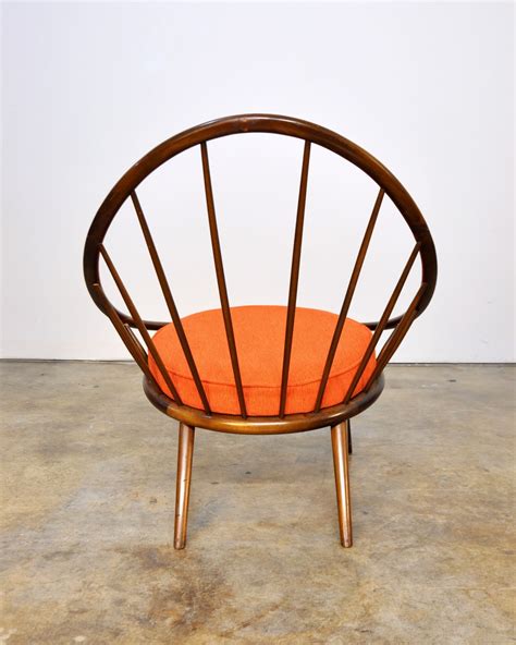 How to spot a fake saarinen tulip table. SELECT MODERN: Early Ib Kofod-Larsen Spindle Back Peacock ...