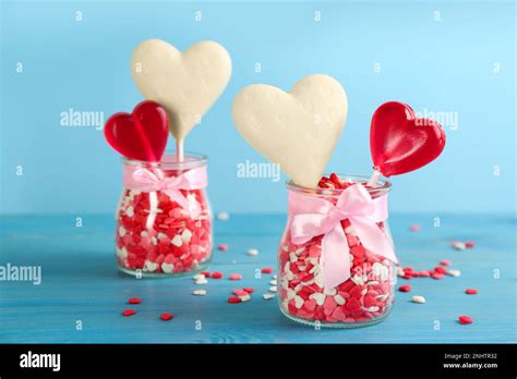 Heart Shaped Lollipops Made Of Chocolate And Sugar Syrup With Sprinkles