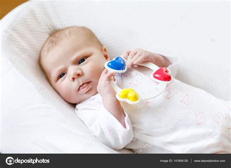 Cute Baby Girl Playing With Colorful Rattle Toy — Stock Photo