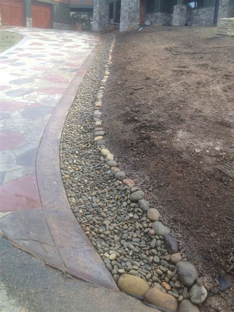 Handling Rainwater Runoff From A Concrete Driveway With Beautiful River
