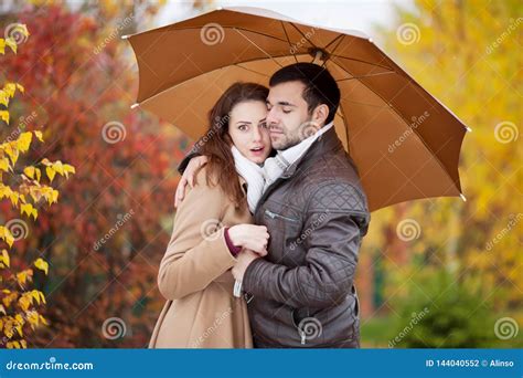 Couple Of Lovers Under Umbrella In The Rain Stock Photo Image Of