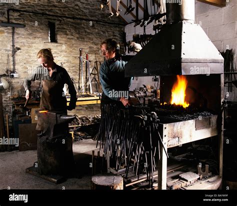 Blacksmiths In Forge With Furnace Stock Photo Alamy