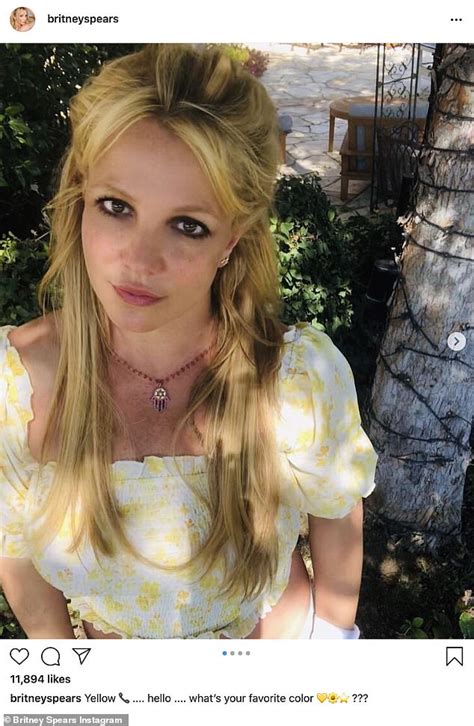 Britney Spears Poses In A One Of Her Favorite Yellow Peasant Blouses