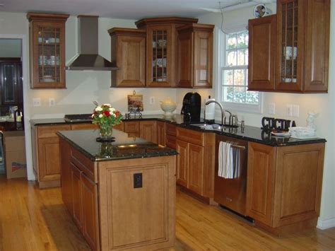 What color quartz countertops go with maple cabinets? Maple cabinets with black countertops | kitchy | Pinterest ...