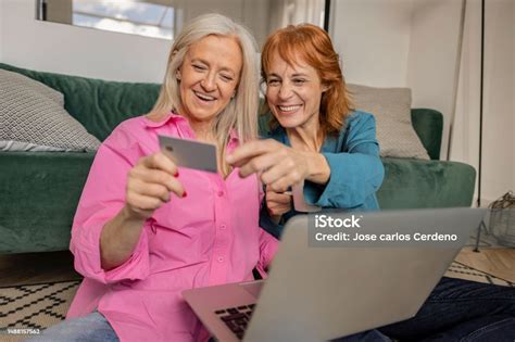 Two Funny Mature Women Lesbian Couple Wear Casual Clothes Use Laptop