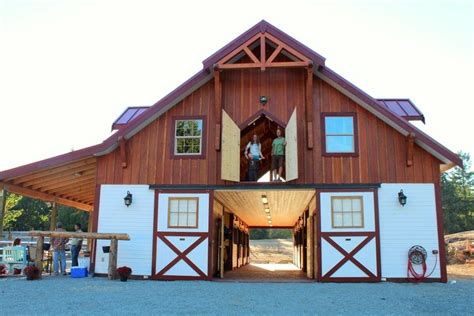 Tour A Rustic Two Tone Barn In Canada Stable Style Barn House Kits