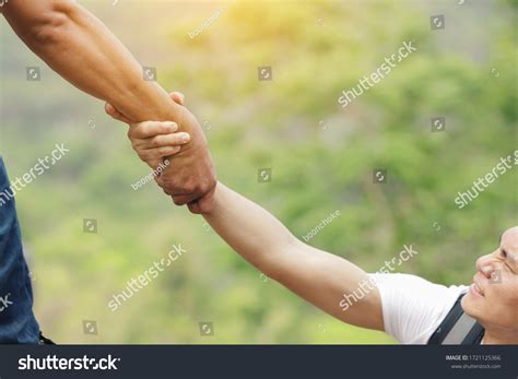 Two Travelers Pulling Their Hands Together Stock Photo 1721125366