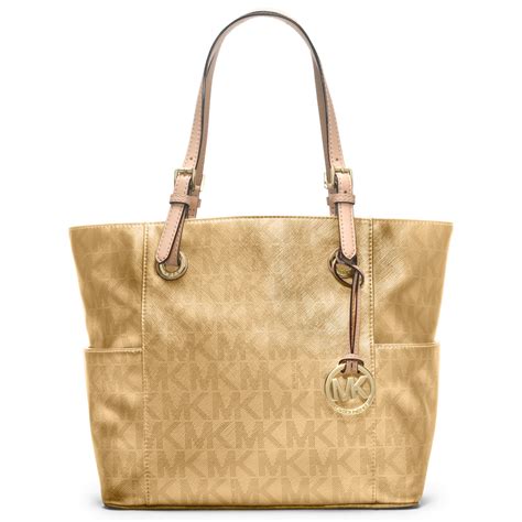 Michael Kors Signature Metallic East West Tote In Gold Lyst