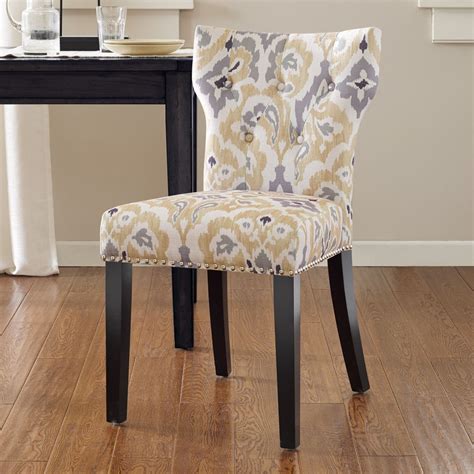 Featuring a curved high back, plush cushioned seat and deep tufted cream velvet upholstery studded with chrome nailheads, this dining chair is sure to take your dining experience to a whole new level. Madison Park Emilia Tufted Back Dining Chair | Dining ...