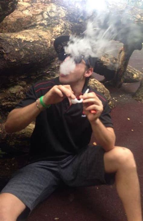Darwin Teen Posts Photo On Facebook Smoking Bong While Wearing Stolen Police Cap