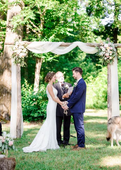 Romantic Wooden Arbor For The Wedding Ceremony Draped In