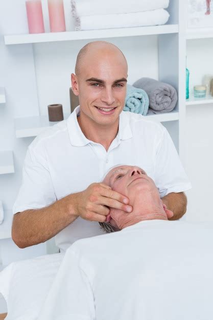 Premium Photo Man Receiving Head Massage