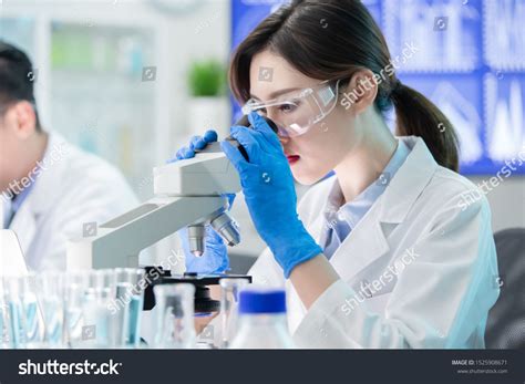 Close Up Of Asian Female Scientist Use Microscope In The Laboratory Ad Spon Female Asian