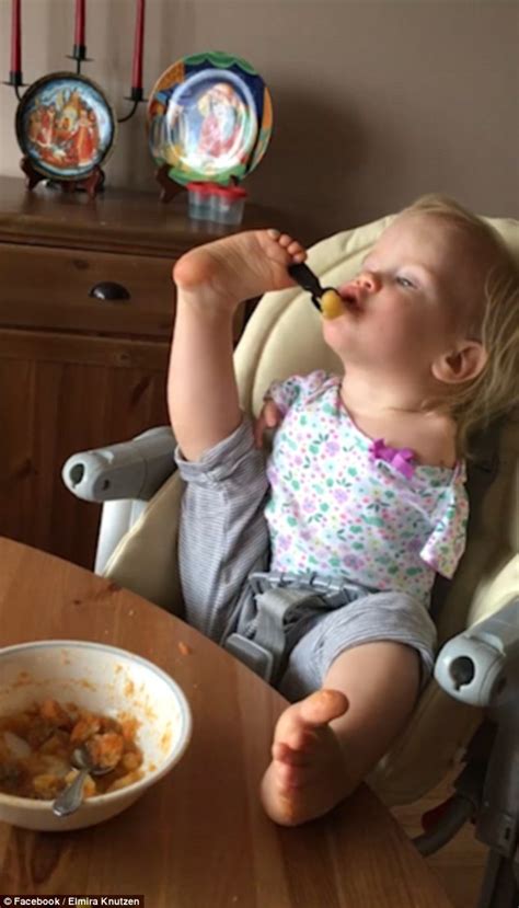 Moment A Russian Toddler Born With No Arms Learns To Feed Herself Using