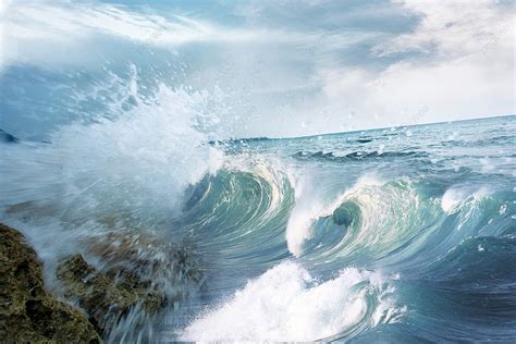 Large Waves Of Ocean Waves Crashing Into Rocks Background Ocean Blue