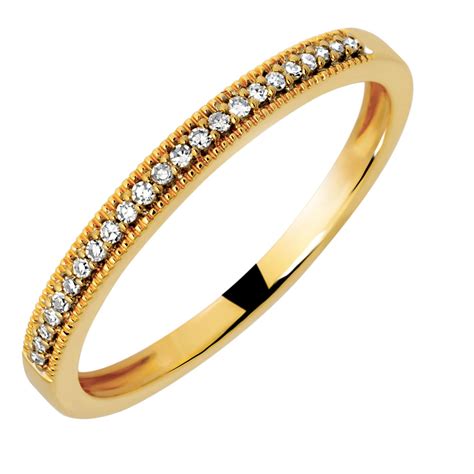 Buy diamond engagement rings, diamond wedding rings etc. Wedding Band with Diamonds in 10ct Yellow Gold