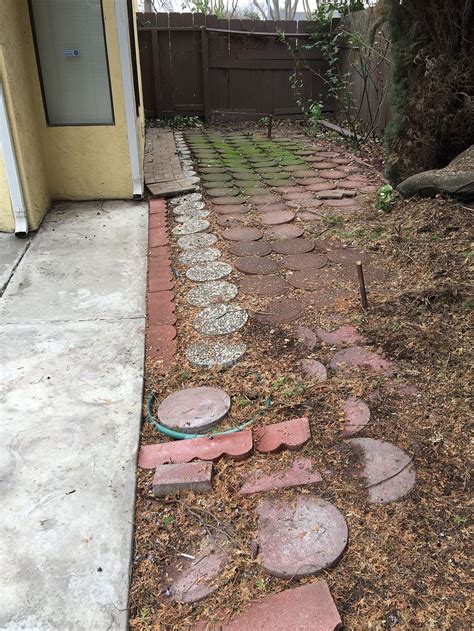 The drain tube itself is covered with permeable landscape fabric. Building Concrete patio against the house with sunken ...