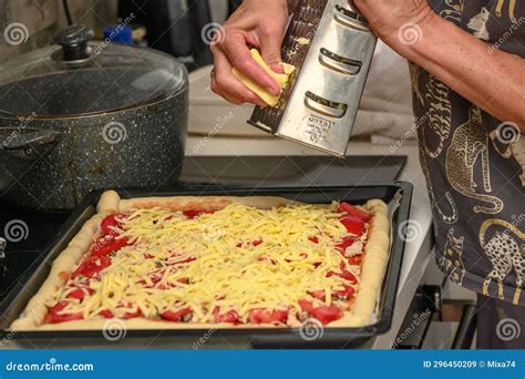 Woman Prepares Pizza With Cheese Tomatoes And Chicken Ham Woman Rubs
