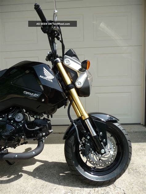 It's similar in size to the grom and comes standard with a very slick style. 2014 Honda Grom