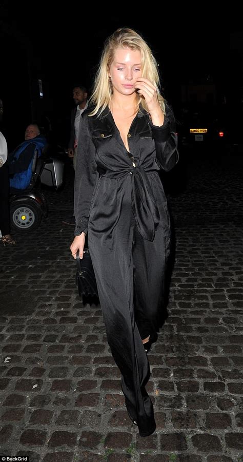 lottie moss displays her braless cleavage in very risqué unbuttoned jumpsuit on night out