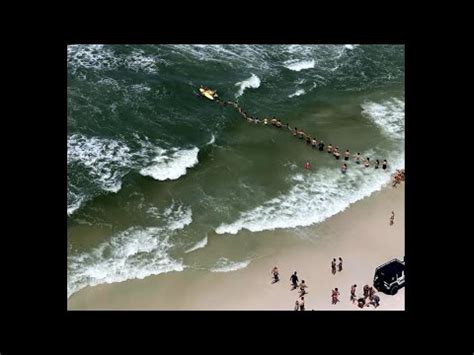 Human Chain Formed To Rescue Swimmers At Florida Beach God TV News