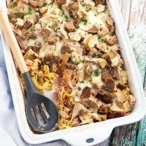 Lay the ⅓ lb corned beef and pickles on one slice of bread and top with the other slice. Reuben Casserole Recipe | The Gracious Wife