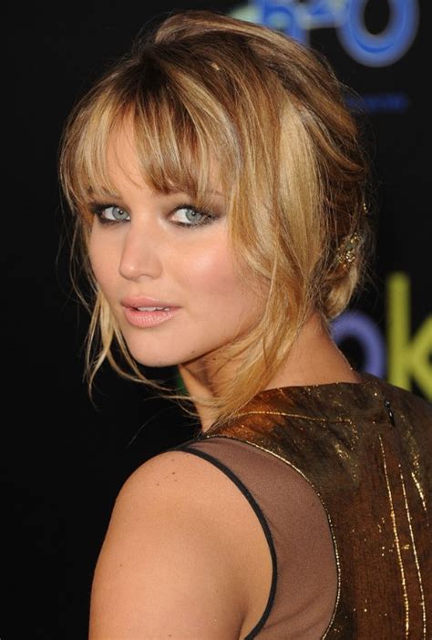 Sexy Casual Loose Bun Updo With Wispy Bangs And Tendrils