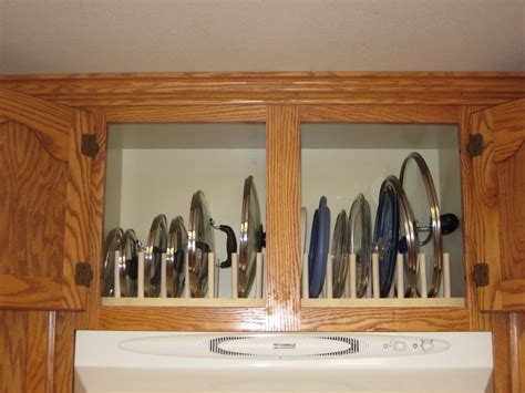 Check out our pan storage rack selection for the very best in unique or custom, handmade pieces from our shops. A Master of None: Pot and Pan Lid Cupboard Rack
