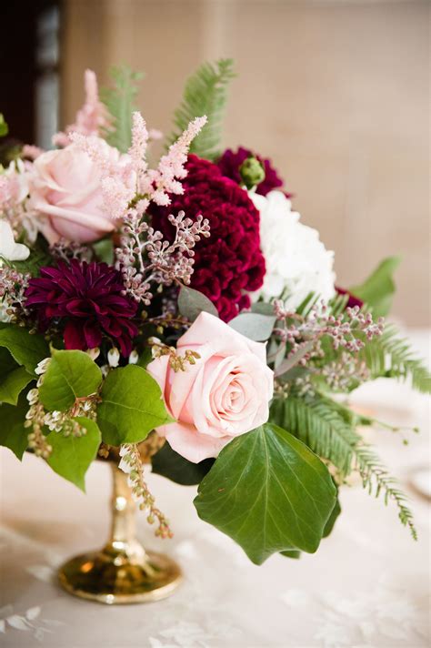 We are excited for you to keep on scrolling to see all that flowers are a wonderful way to add your chosen color and there are so many beautiful seasonal choices in burgundy. Burgundy dahlia, pink rose, seeded eucalyptus, wedding ...