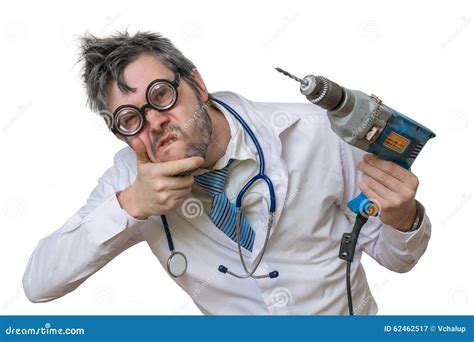 Funny And Crazy Doctor Is Laughing And Holds Saw In Hand On Whit Stock
