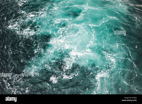 Deep Blue Stormy Sea Water Surface With White Foam And Waves Pattern