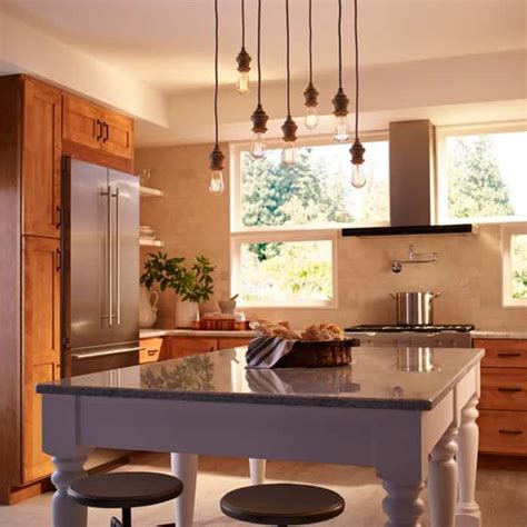 The kitchen island remains popular and extremely effective. Spacing Pendant Lights Over Kitchen Island 2020 - A Nest ...