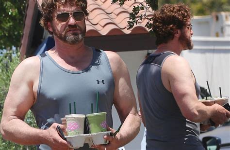 [pics] gerard butler shows off bulging muscles in a tank