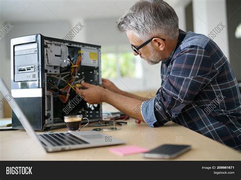 Technician Repairing Image And Photo Free Trial Bigstock