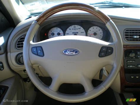 2003 Ford Taurus Sel Medium Parchment Steering Wheel Photo 42964491