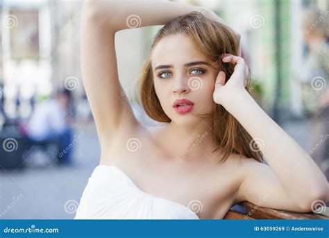 Close Up Portrait Of Beautiful Model Woman In Long White Dress Stock