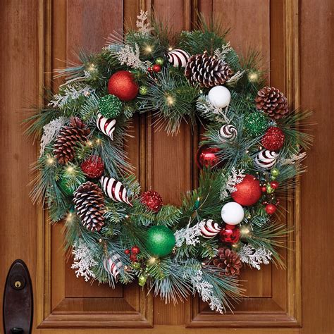 The Cordless Prelit Festive Twist Holiday Wreath Hammacher Schlemmer