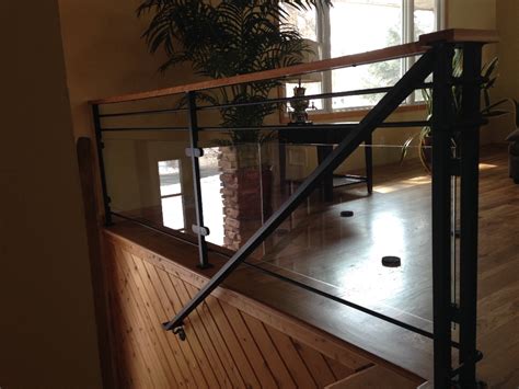 Choose from 1/4 inch or 3/8 inch tempered glass. Iron Railings - Artistic Ornamental Iron of Minneapolis, MN