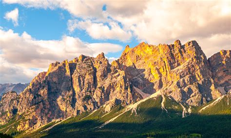Rocky Ridge Of Pomagagnon Mountain Above Cortina Dampezzo With Green