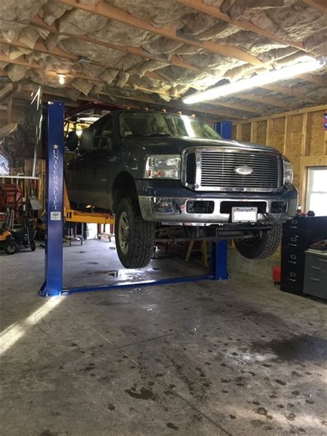 You can easily store more vehicles with the help of this unit. UNIVERSALIFT 11KAF - 2 Post Truck Lift | North American Auto Equipment