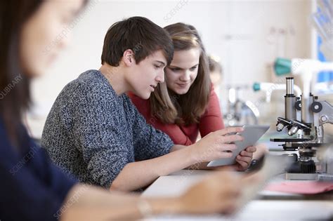 Students using tablet computer in class - Stock Image - F006/6920 ...