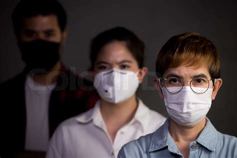 People Wearing Surgical Masks Stock Image Colourbox