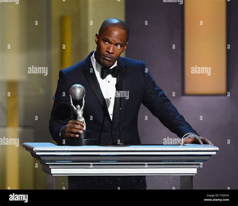 Actor Jamie Foxx Accepts The Entertainer Of The Year Award During The