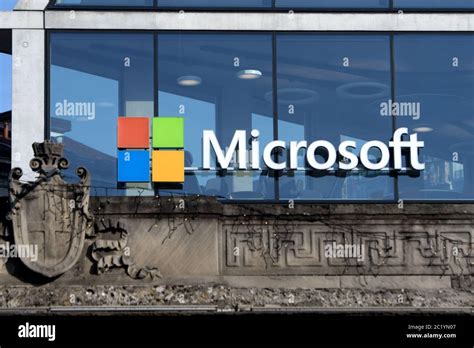 Microsoft Logo Company On The Window Facade Of The New Microsoft