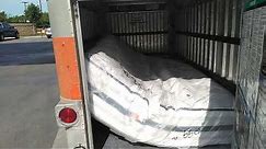 A queen size mattress will fit in a 4x8 U-Haul trailer without the box spring. - VOTD