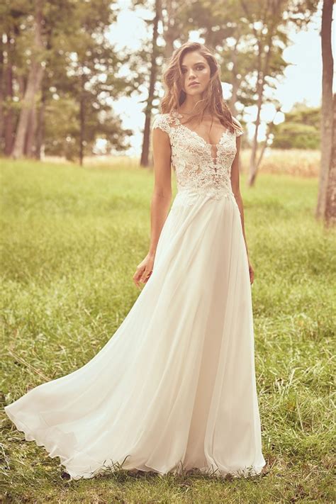 Affordable wedding dresses | preownedweddingdresses.com. Celebrate Lillian West's Whimsical Romanticism Dress Line