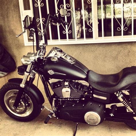 Its tough, dark styling and retro feel, along with a retro price tag, give riders the confidence to sit low and stretch out. Dyna Ape Hangers photos ? - Page 13 - Harley Davidson Forums